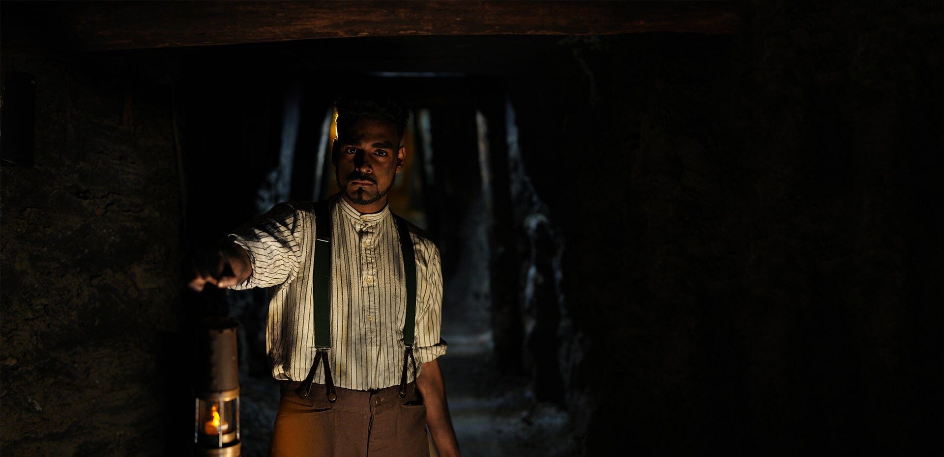 Underground Mine Man Holding Lantern